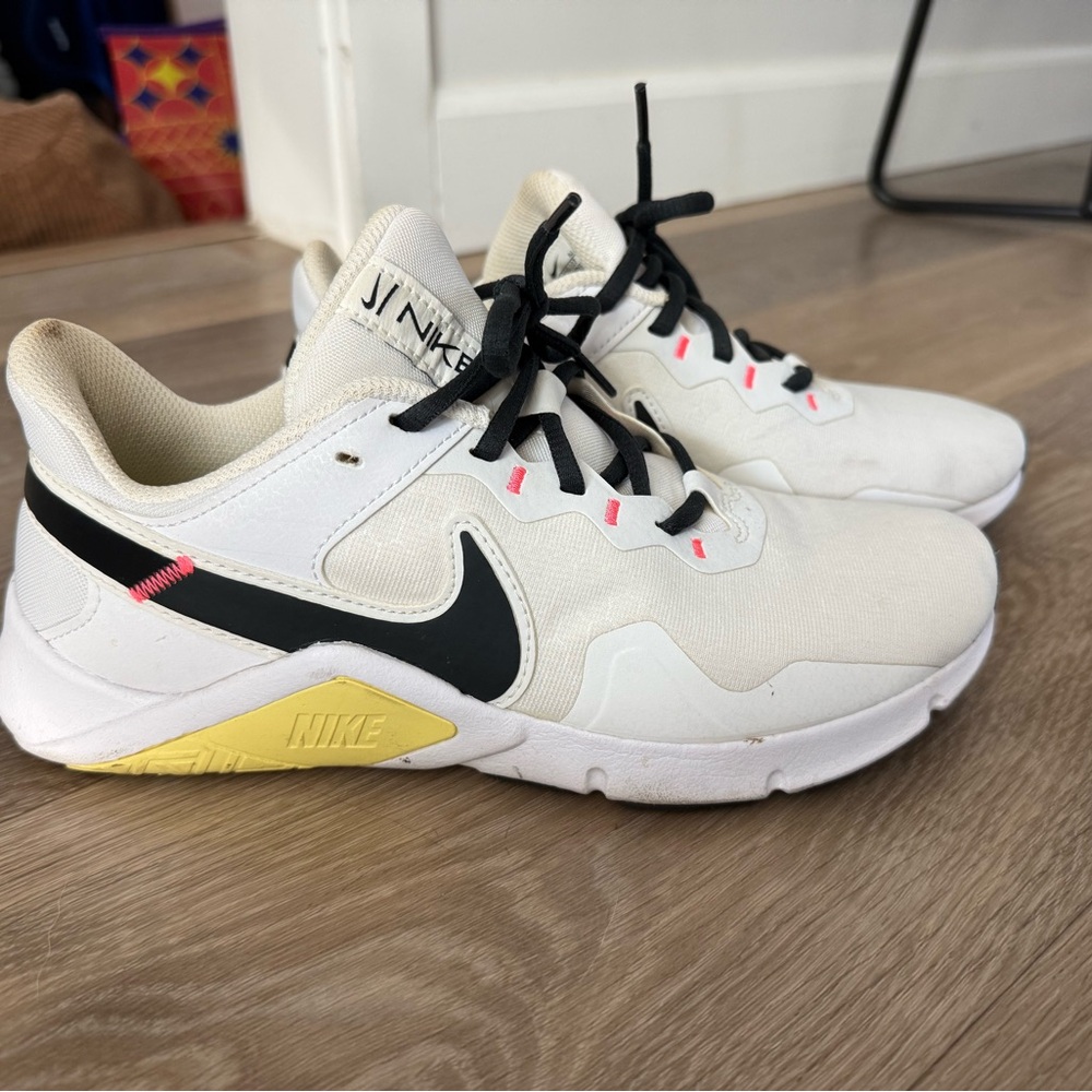 Nike White and Black Athletic Shoes with Yellow Accents